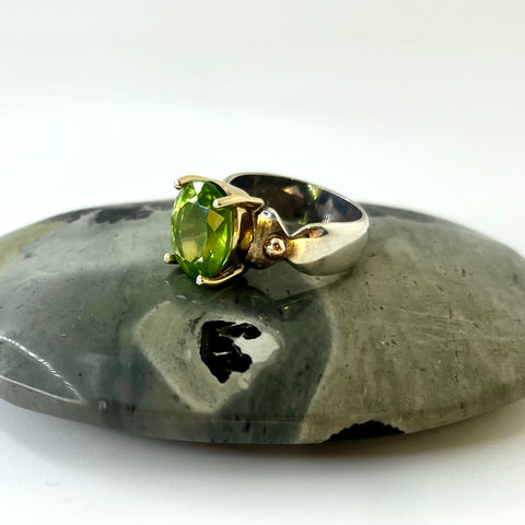 Oval Peridot Gold and Silver Ring
