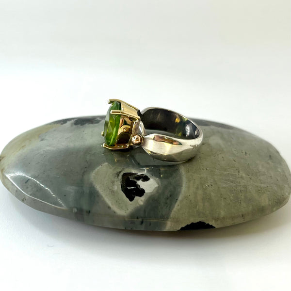 Oval Peridot Gold and Silver Ring