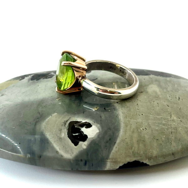 Oval Peridot Gold and Silver Ring