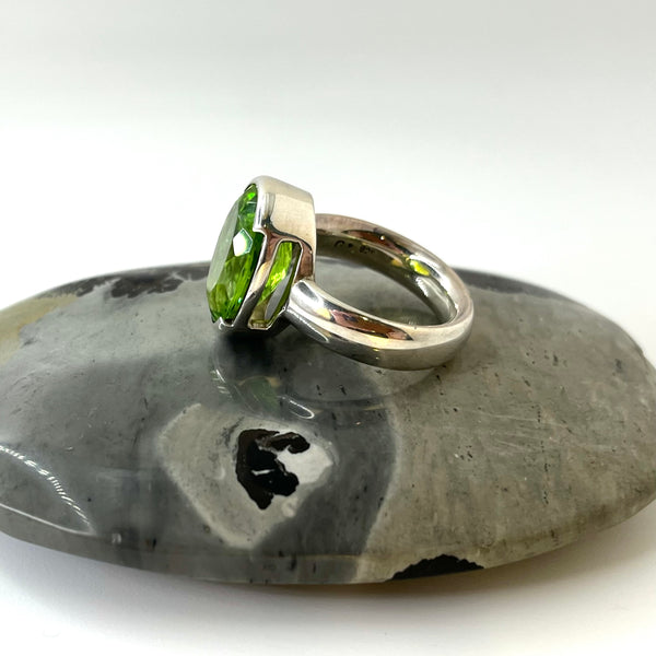 Oval Faceted Peridot Silver Ring